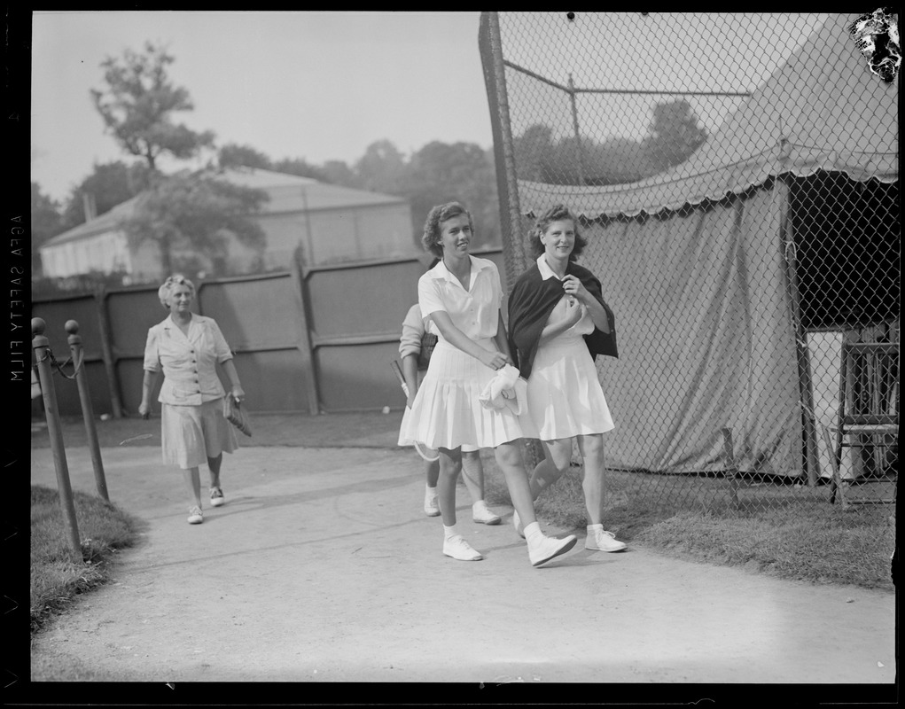 Two girl tennis players ready for match