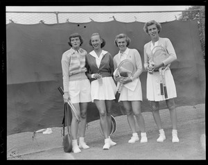 4 women with tennis rackets