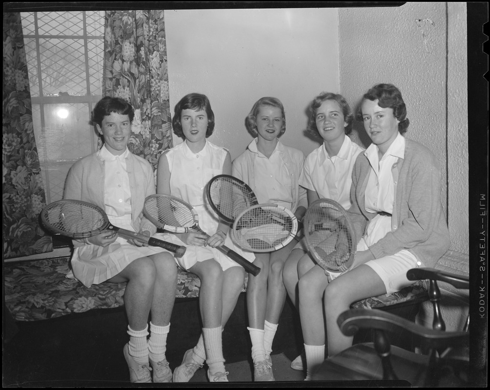 People wielding tennis rackets (8)