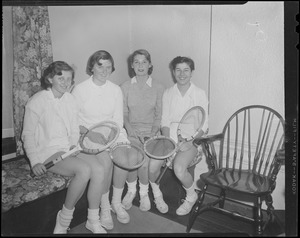 People wielding tennis rackets (8)