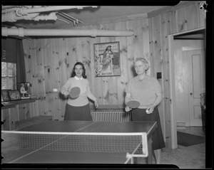 Hazel Wightman tries her hand at ping pong at her home at 17 Dorothy Rd., Newton