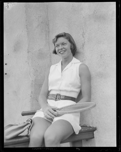 Woman player smiles for camera