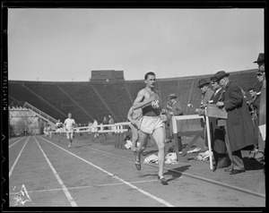 Holy Cross man crosses finish line at Harvard Stadium