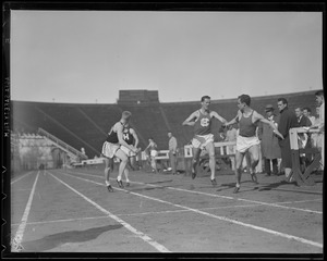 Harvard vs. Holy Cross relay race at Harvard Stadium
