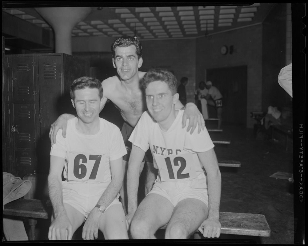 Athletes in locker room at track meet, after 1934