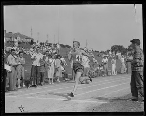 Former Boston University star John J. Kelley wins 12 1/2 mile race at Needham