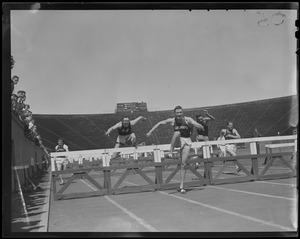 Dartmouth runner leads in hurdles, Harvard Stadium