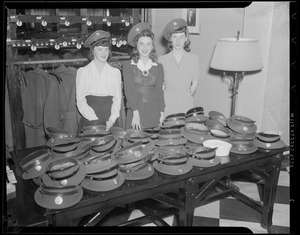 Hat check girls with Navy hats, WWII