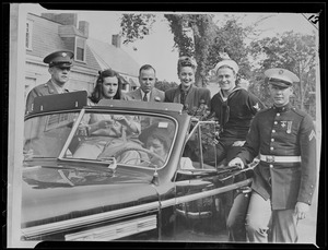 Group with auto including military men