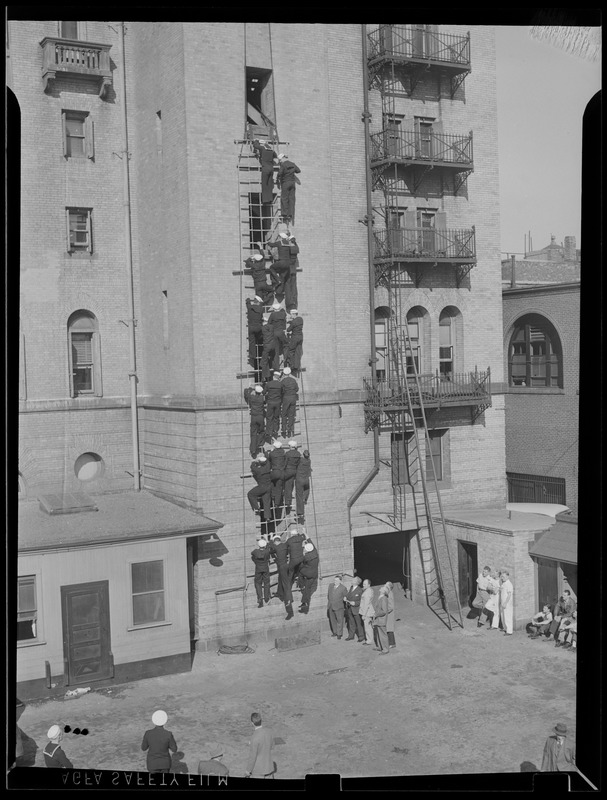 Sailors train for fire drill, possibly at Bristol Street Fire Headquarters