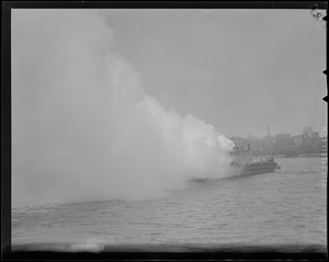 Barge burns for demonstration, Boston Harbor
