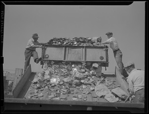 WWII: Three men - scrap metal collection