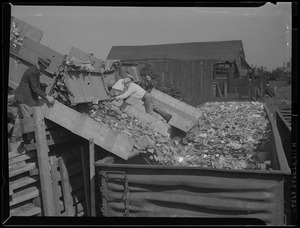 WWII: Four men - scrap metal collection?