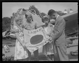 Japanese flag examined, Boston Common, WWII era
