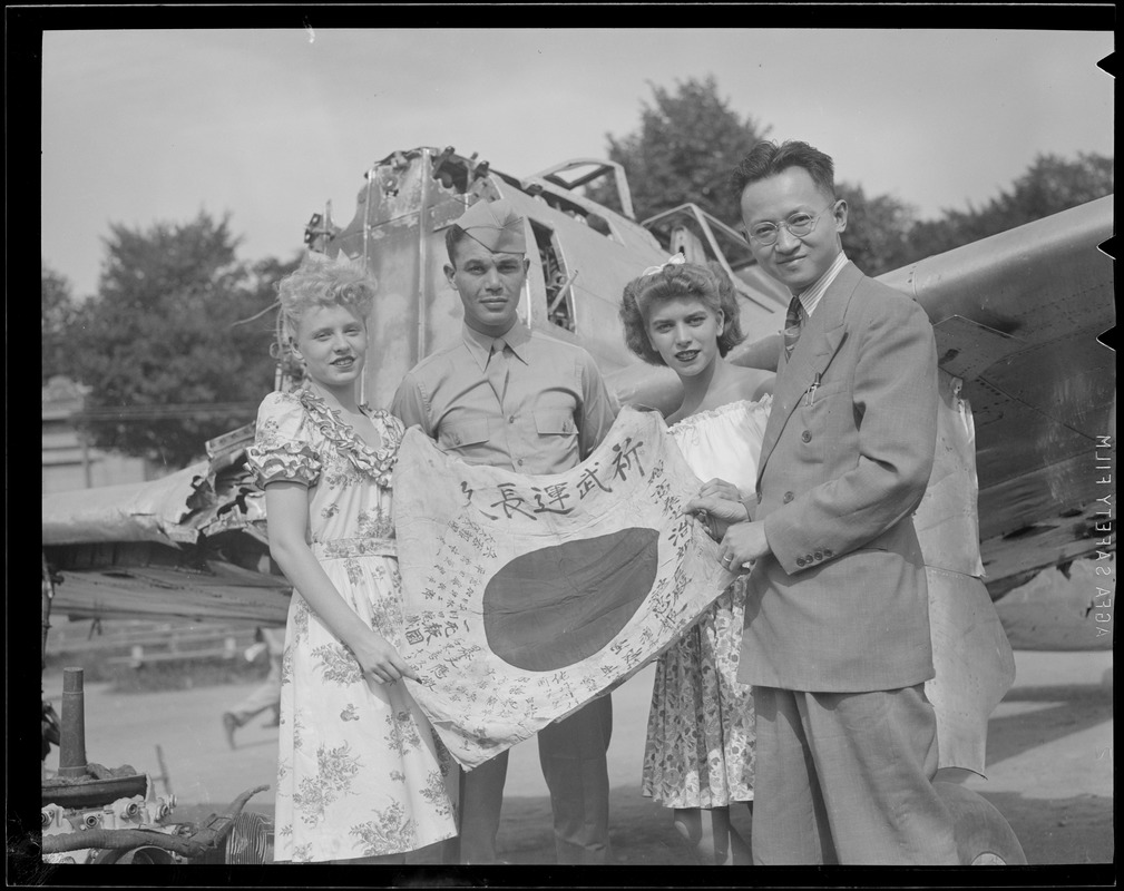 Japanese flag examined, Boston Common, WWII era