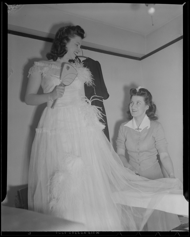 Putting on party dress, Franklin Square House, WWII