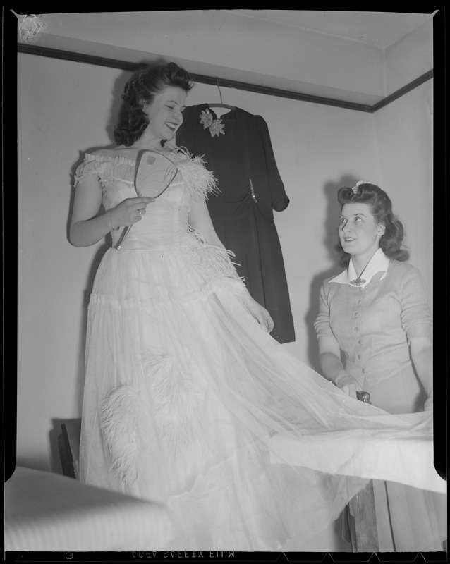 Putting on party dress, Franklin Square House, WWII