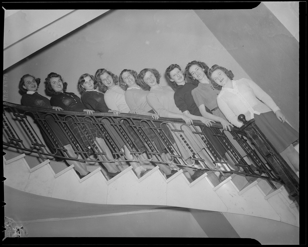 Girls pose on staircase, Franklin Square House, WWII