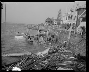 Boats damaged in Marblehead Harbor by Hurricane Carol