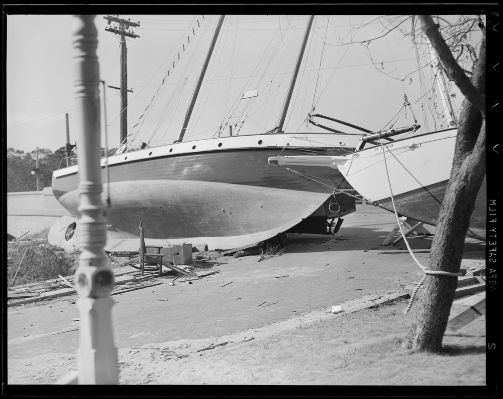Sailboats thrown up on shore, Hurricane of 38
