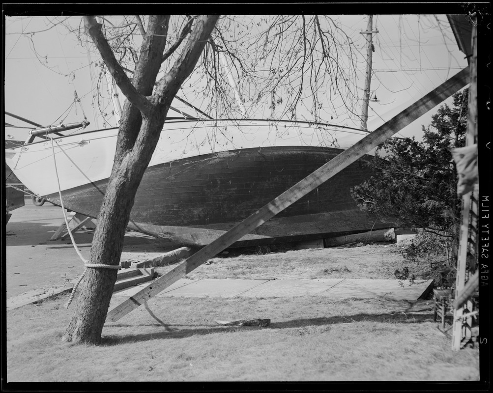 Sailboats thrown up on shore, Hurricane of 38