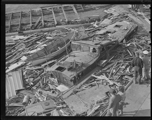 Boats and debris on beach, Hurricane of 38