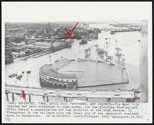 Postponed, Wet Grounds--The Quad City Angeles had been scheduled to play today, but the flooding Mississippi River forced a cancellation for the duration of the high waters. In foreground is the ballpark with the lower end of the Davenport business area in background.