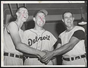 Detroit Victory Smiles are registered as Al Kaline, left, American League runs batted in leader, and Ray Boone, right, shake hands. In center is rookie pitcher Werner (Babe) Birrer who won his third game.