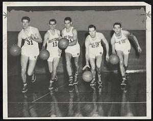 Crusaders Of Holy Cross, who meet their first big test tonight against St. John's in Madison Square Garden. The Purple will make their Boston debut next week, meeting Oklahoma at the Garden Tuesday and Vanderbilt Thursday. Left to right, Jim Kielley, Bob McLarnon, Gene Mann, Wally Baird, and Jimm Dilling.