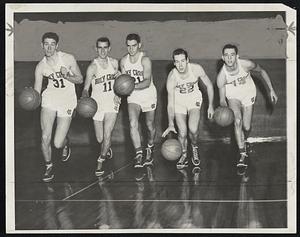 Crusaders Of Holy Cross, who meet their first big test tonight against St. John's in Madison Square Garden. The Purple will make their Boston debut next week, meeting Oklahoma at the Garden Tuesday and Vanderbilt Thursday. Left to right, Jim Kielley, Bob McLarnon, Gene Mann, Wally Baird, and Jim Dilling.