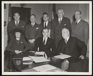 New Boston Recreation Board, whose job is to build up and coordinate recreational activities in the city, held its first meeting yesterday. Seated, left to right: Miss Ellen H. Gleason, Mayor Kerrigan and Park Commissioner William P. Long. Standing, left to right: Thomas J. Turley, chairman of the seven-man board, James E. Murphy. Joseph Lee, Richard P. Casey and Joseph V. Comerford.