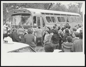 Beacon St. near Park St. M.B.T.A. – Bus – front of State House crowd trying to tip it over – but did not succeed..