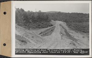 Contract No. 66, Regulating Dams, Middle Branch (New Salem), and East Branch of the Swift River, Hardwick and Petersham (formerly Dana), looking westerly at dam 2 from Sta. 50+50, middle branch regulating dam, Hardwick, Mass., Aug. 8, 1939