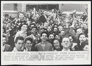 Teachers' Strike Brings Holiday--Students pour out of Central High School, Providence this morning after being told in assembly that due to the AFL teachers' strike there would be no school.