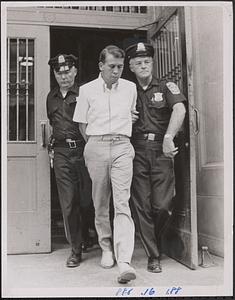 Michael Ware with officers Connie Moynahan (L) & Al Hirst. Murderer