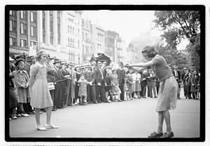 Two young women competing, Boston Common