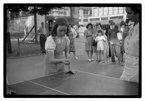 Girls playing a game of jacks, Boston Common