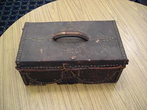 Dark box with studded decorations