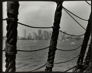 Skyline of Boston through ship's rigging