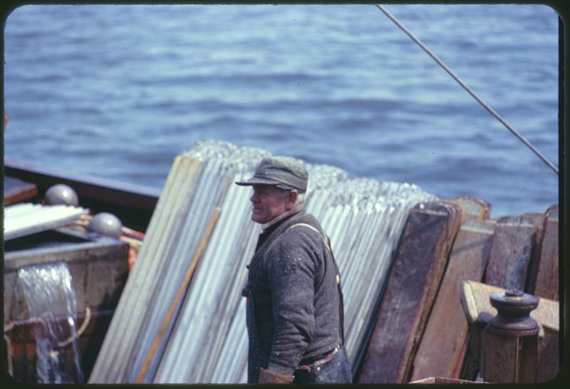 Man on dock or boat