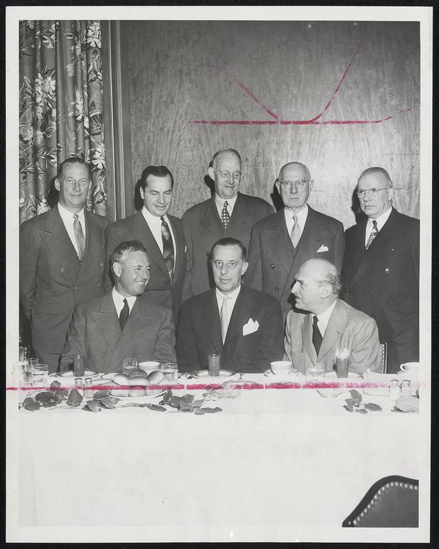 Grocery Executives gathered at the Parker House yesterday to honor leaders of two California wholesale food concerns. Seated, left to right, are Roland Tognazzini, president of Rosenberg Brothers and Co.; Robert Abbott of the sponsoring Abbott, Hall and Co., and Nathan Cummings, board chairman of California's Consolidated Grocers Corp. Standing are George Hall, Clarence Kane of Rosenberg Brothers, Arthur Hall, Frank Abbott and Paul Balch.