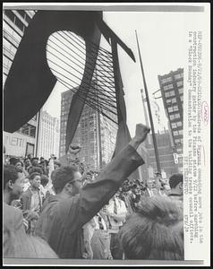 Chicago: Hundreds of Negroes demanding more jobs in the construction industry by the Picasso statue 9/22 before marching in a "Black Monday" demonstration to the building trades council offices.