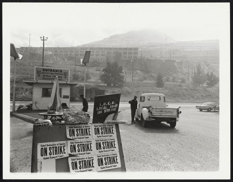 Strikes were in evidence in various parts of America. Like this one, at the Kennecott copper plant, at Magna, Utah, where signs were posted to announce the decision of Local 1845, United Steelworkers of America. Trucks attempting to enter were either redirected or asked to honor the silent picket line. It has been going on for two months, and workers were even beginning to hope for the end, for the holidays are coming and young children would not understand.