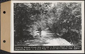 Contract No. 106, Improvement of Access Roads, Middle and East Branch Regulating Dams, and Quabbin Reservoir Area, Hardwick, Petersham, New Salem, Belchertown, looking ahead from Sta. 172+00, access road to East Branch Regulating Dam, Belchertown, Mass., Jun. 27, 1940