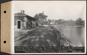 Contract No. 99, Enlargement of Fells High Level Distribution Reservoir, Stoneham, Malden, Melrose, looking east showing boulder guard rail by gatehouse, enlargement of Fells Reservoir, Stoneham, Mass., Sep. 27, 1940