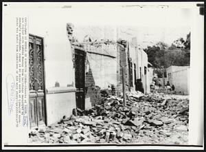 Rubble In Peruvian Quake -- Streets of Sayan, Peru, are filled with rubble Monday from buildings destroyed by Sunday's earthquake. Sayan is 60 miles north of Lima.