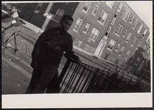 Young man standing outside at Newtowne Court