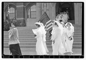 Religious procession leaving Eisner Administration building, Emmanuel College