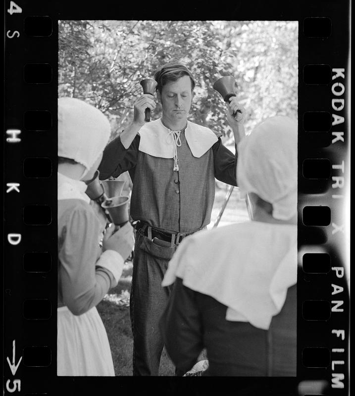 Playing hand bells on 17th Century Day in costume, Ipswich