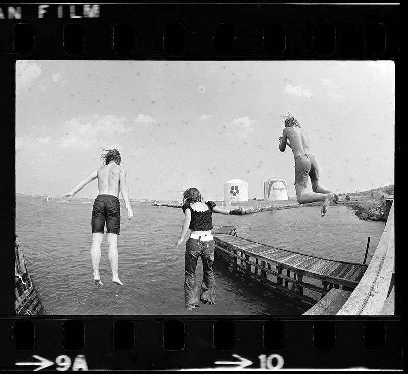Boys dive into Dorchester Bay by "Sister Corita" BostonGas tanks, Dorchester